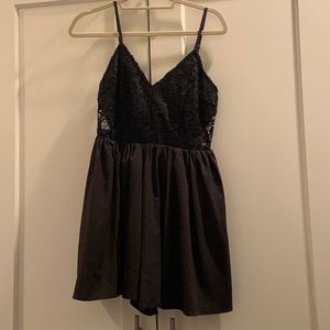 Tobi black romper (never worn)